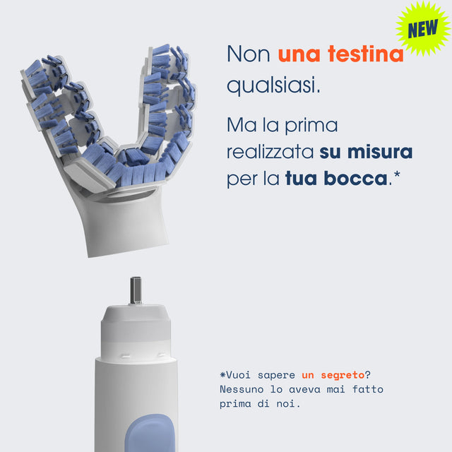 Spazzolino elettrico Smartbrush con testina su misura, design ergonomico per pulizia accurata.
